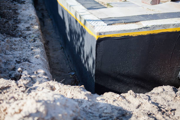 Professional Waterproofing technician working in Powell, TN